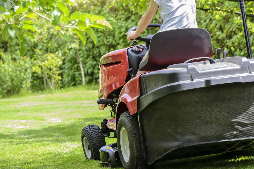 mowing the grass, gardening, lawn, garden, care, lawnmower, tractor, woman mowing, green, summer, relaxation, nature, automation, machine, garden accessories, hobby, grass